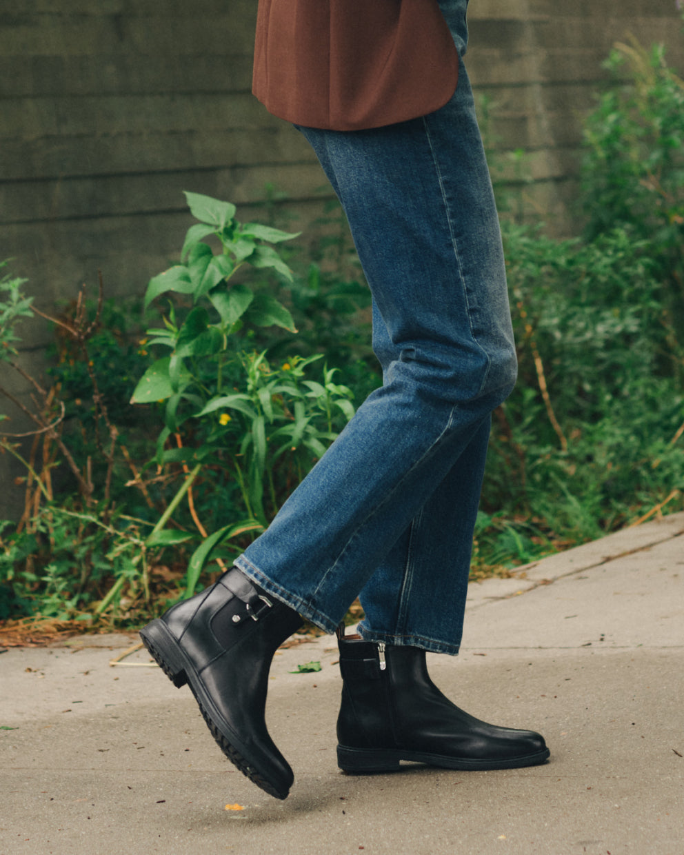 Promotional banner featuring dress boots