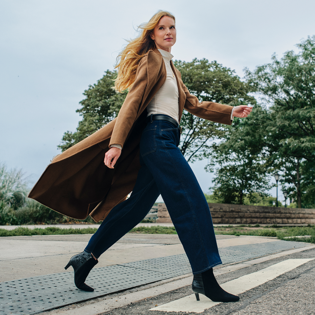 Promotional banner featuring dress boots